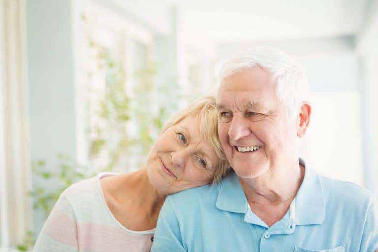 retirees smiling with peace of mind