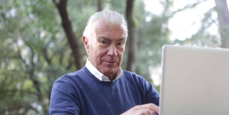 Elderly man on laptop