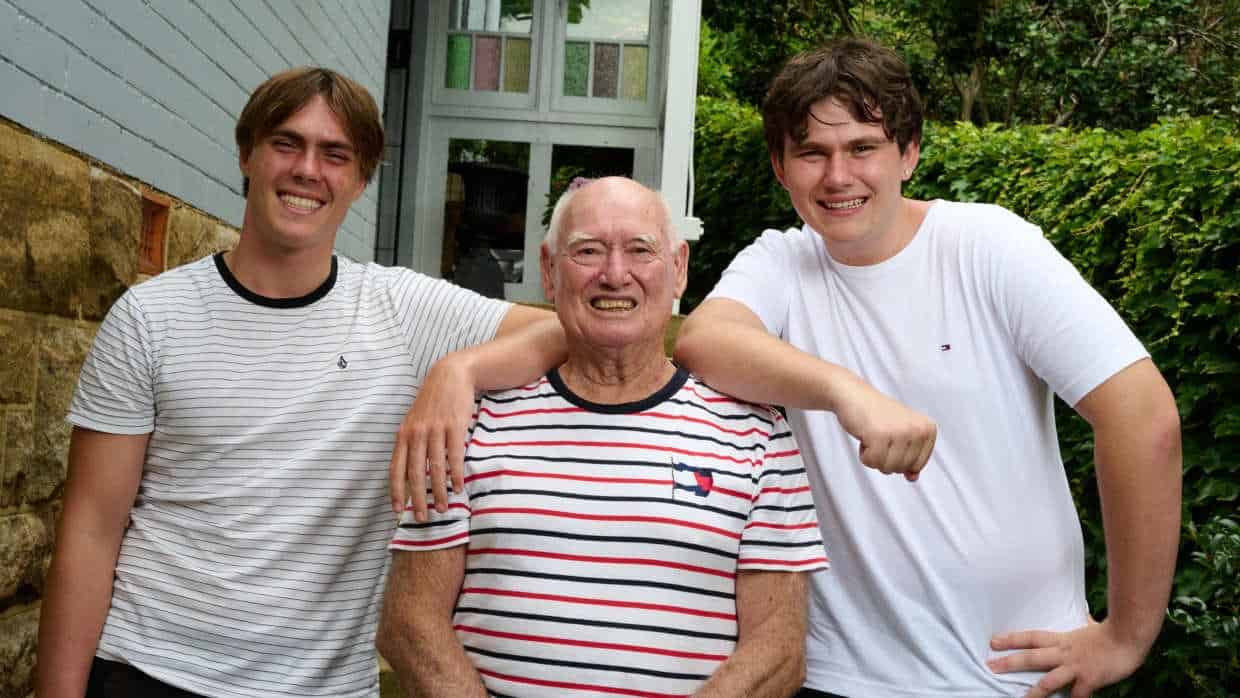 Richard Doherty and grandsons Myles and Elliott smile for a picture together